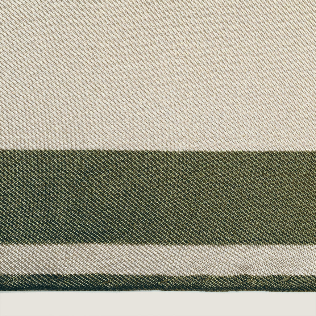 The Crossing silk carré — silk twill and hand-rolled edge, close up
