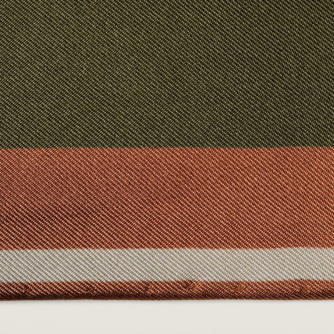 The Graft silk carré — border and hand-rolled edge, close up