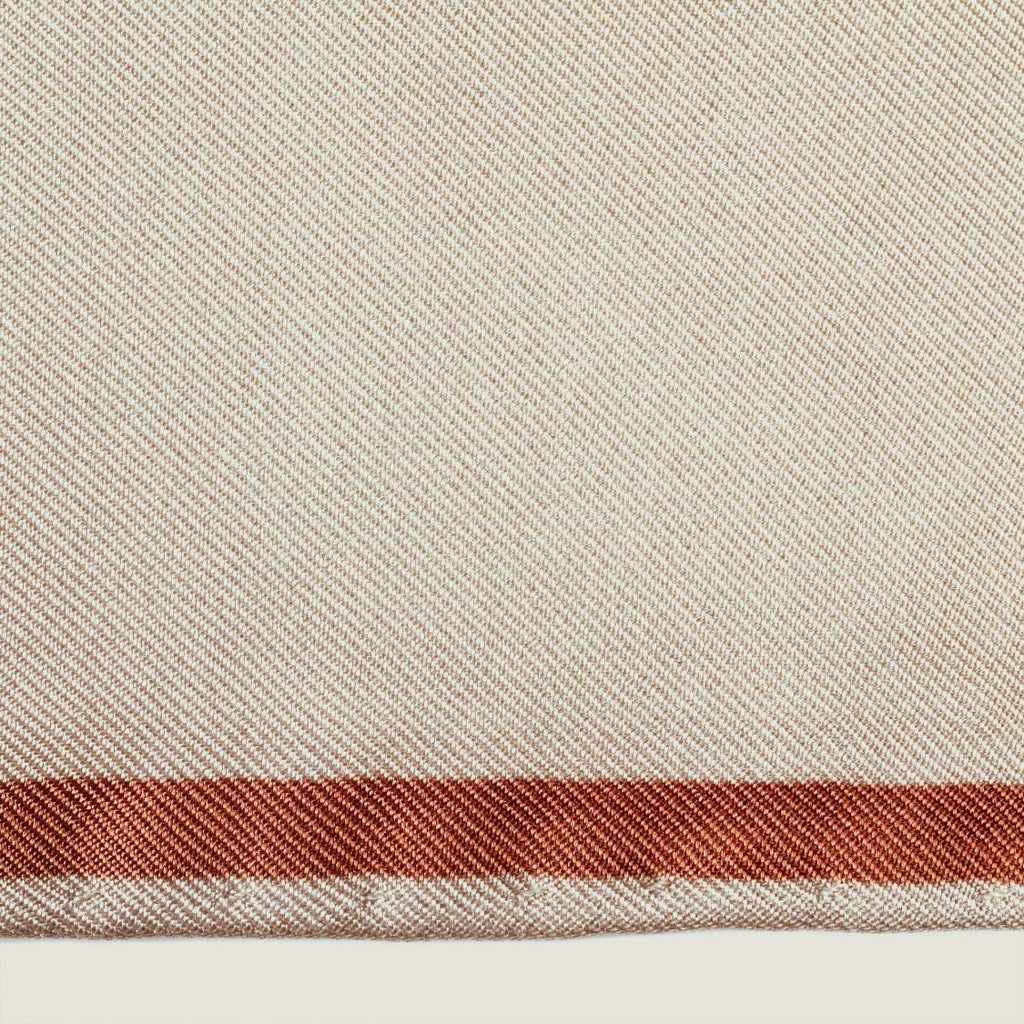 The Quatrefoil silk carré — silk twill and hand-rolled edge, close up