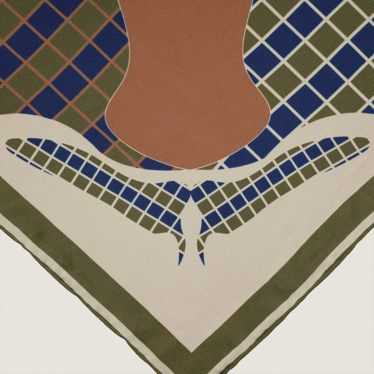The Crossing silk carré — corner motif with the green border